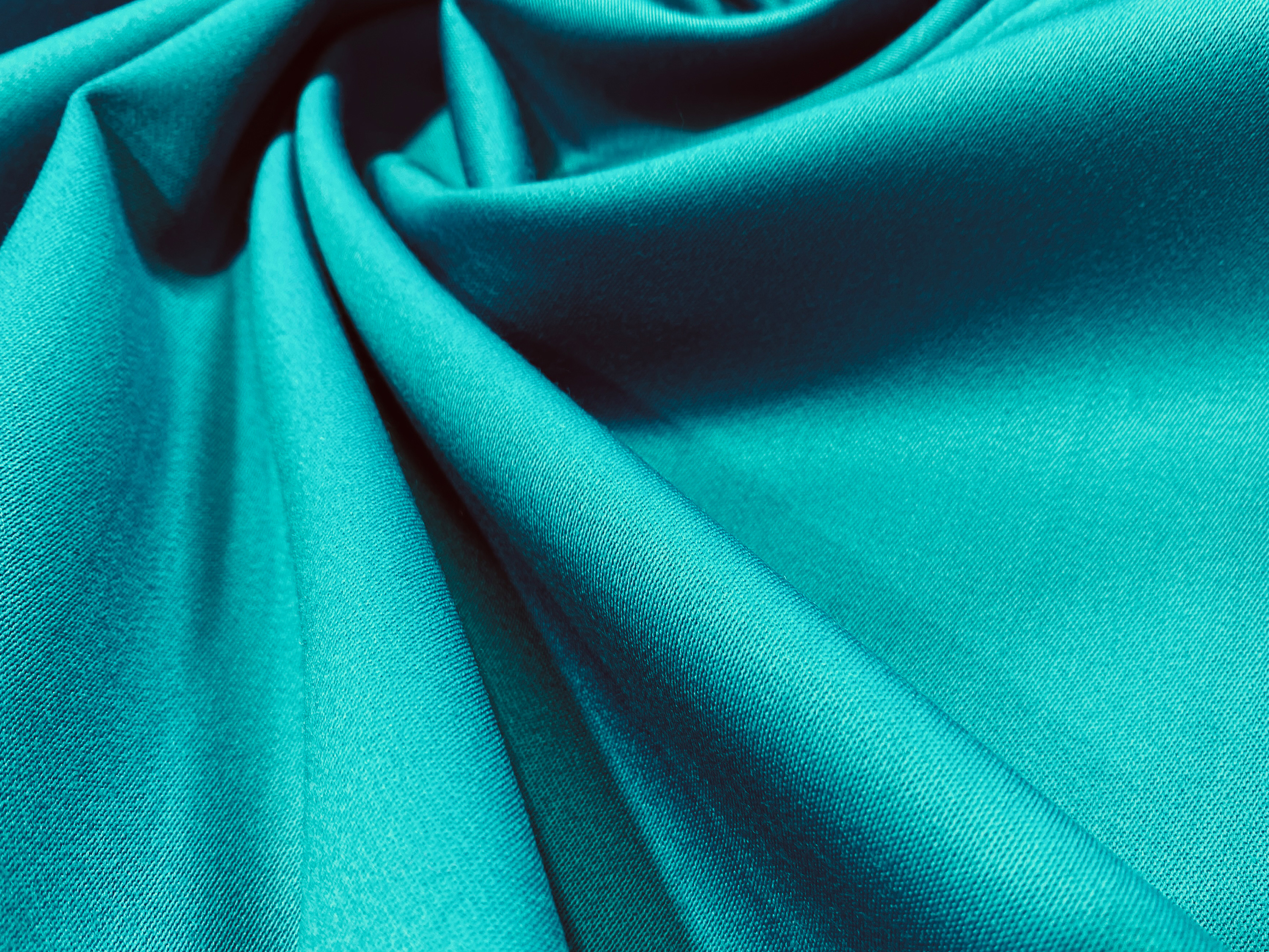 Elastischer Wollsatin türkisblau