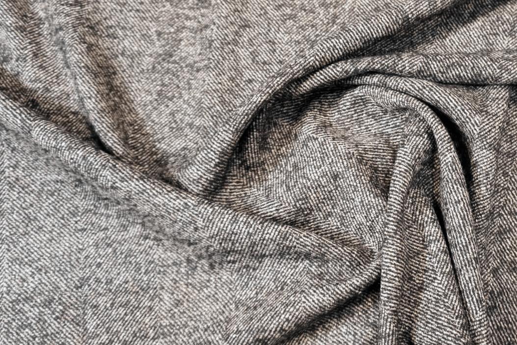 Schurwolle - Fischgrat schwarz-beige meliert