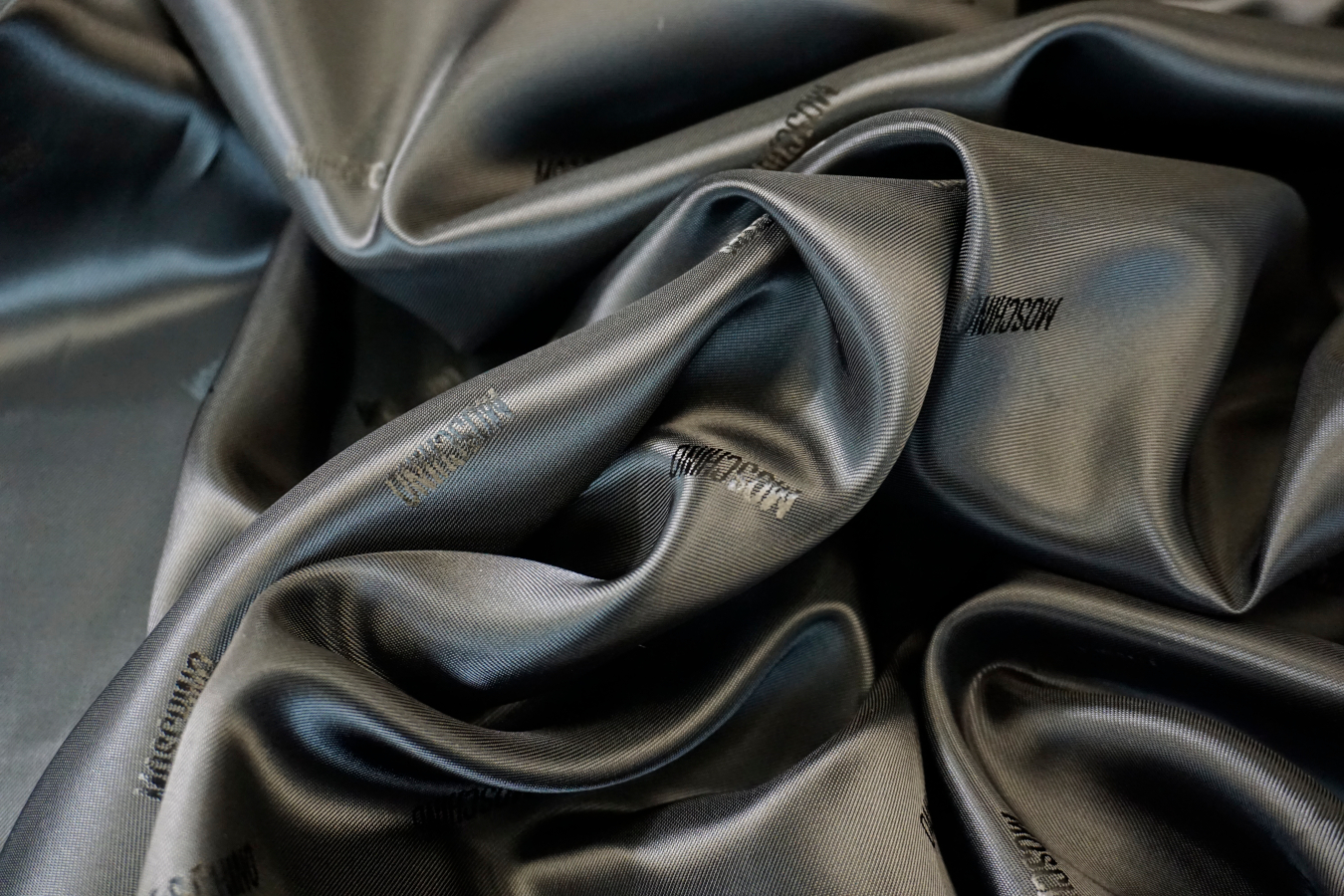 Futterjacquard - Schriftzug, schwarz