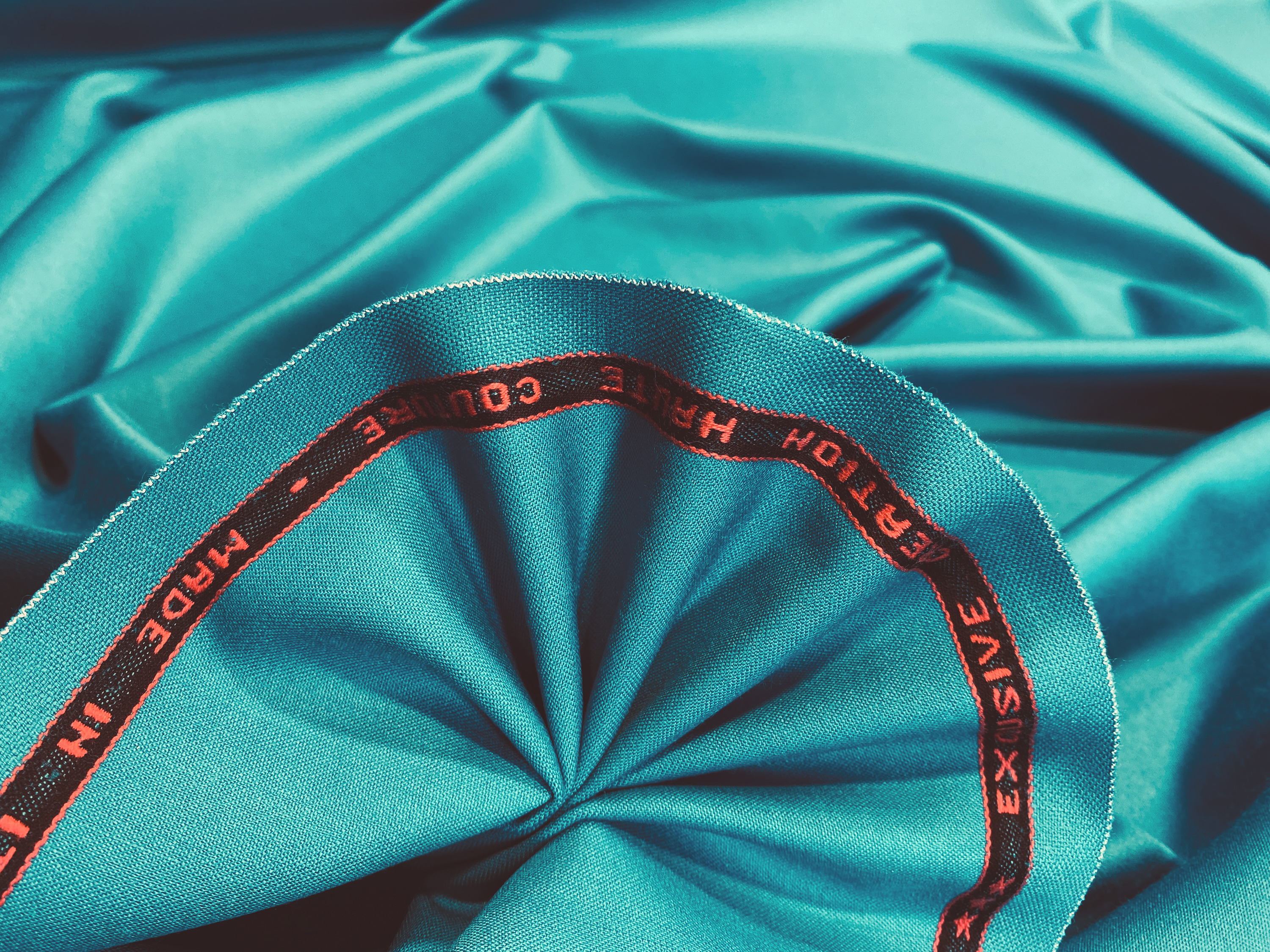 Elastischer Wollsatin türkisblau