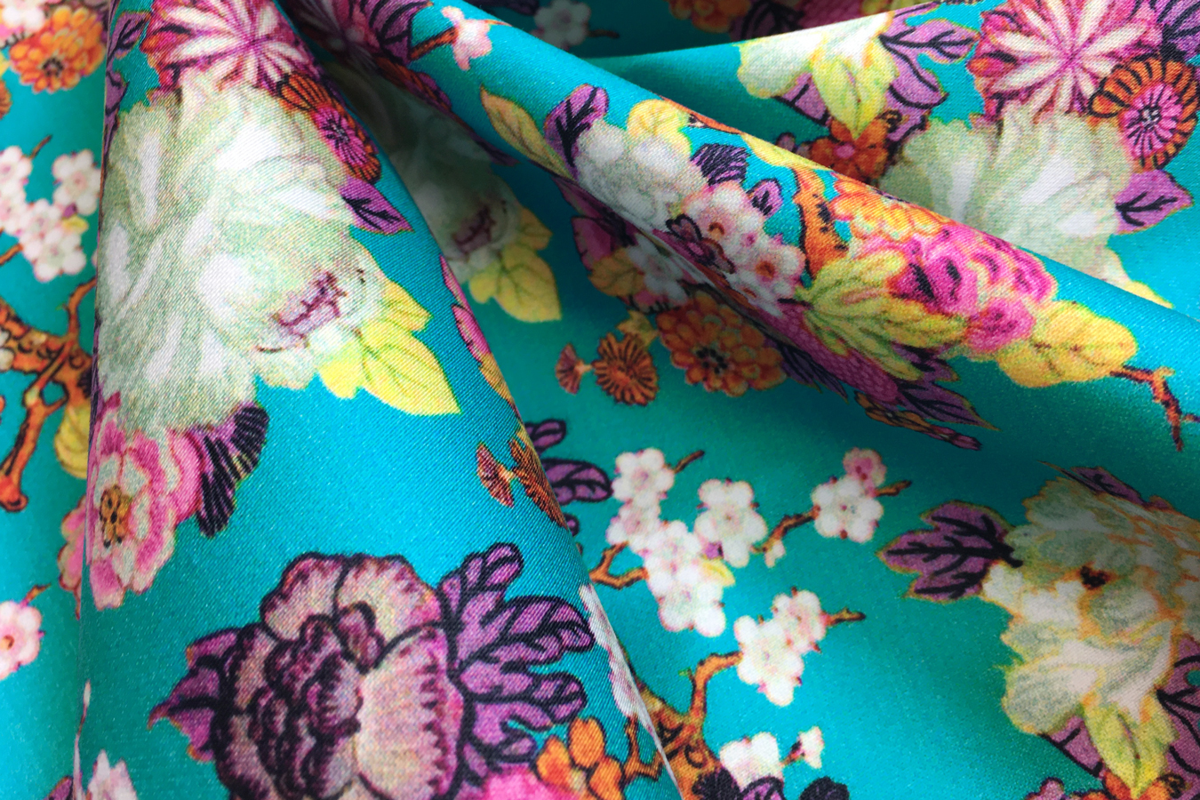 Baumwollstretch - Blüten auf türkis